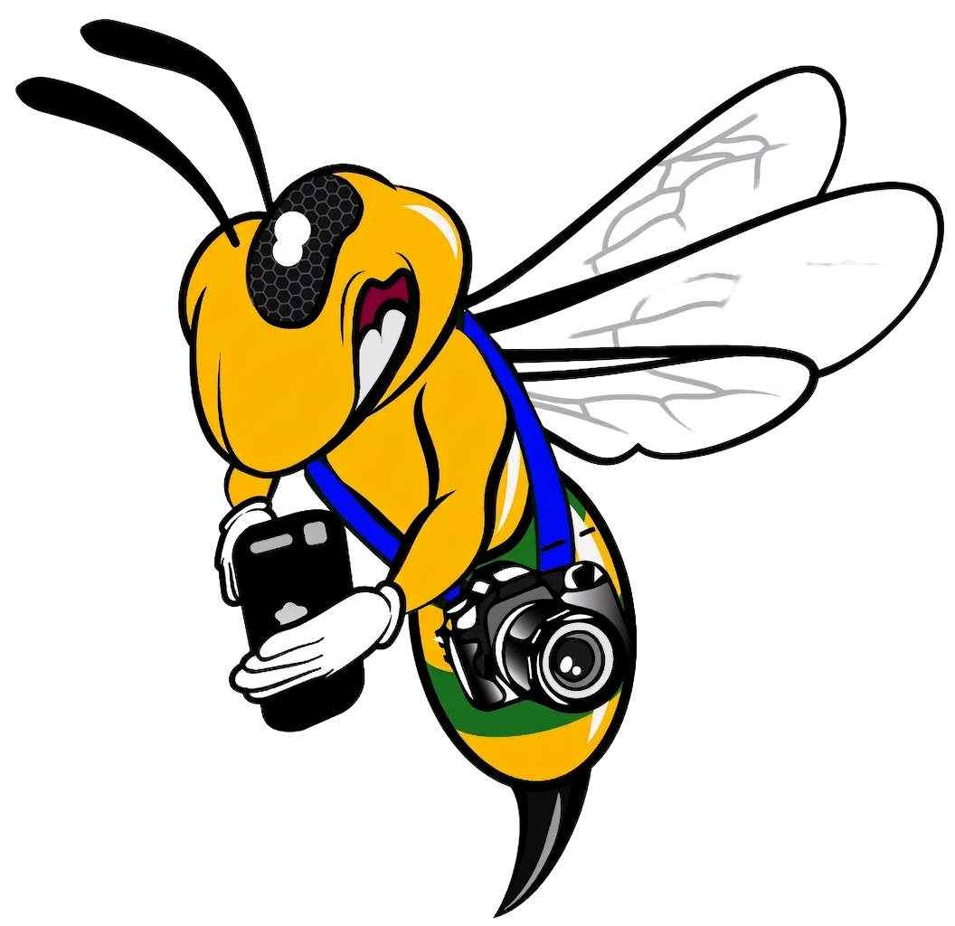 Montie Smaakmaker mascot bytjie met kamera en selfoon